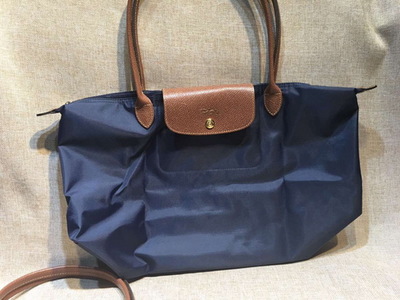 淘宝十大皮具品牌店排行榜(国内十大皮具品牌女包排行榜)插图